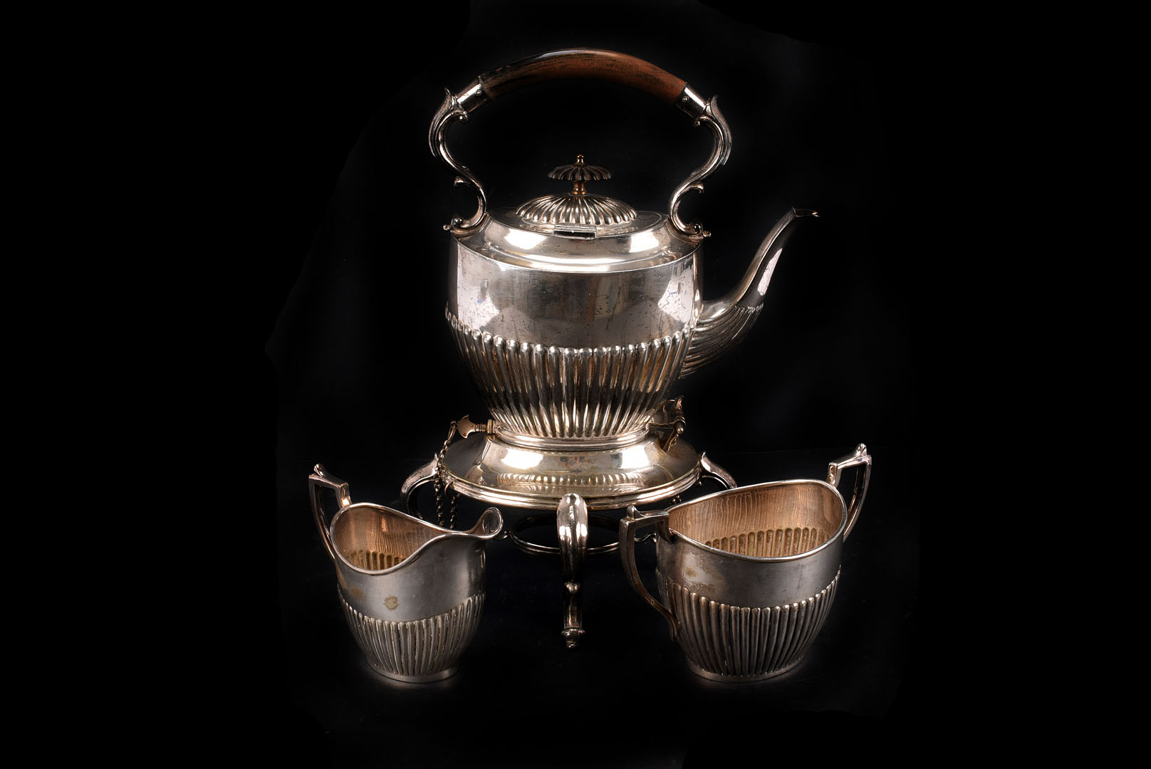 A group of Victorian and later silver plated items, including a spirit fired kettle on stand with