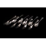 An associated set of five Victorian and later V silver forks and six dessert spoons by George