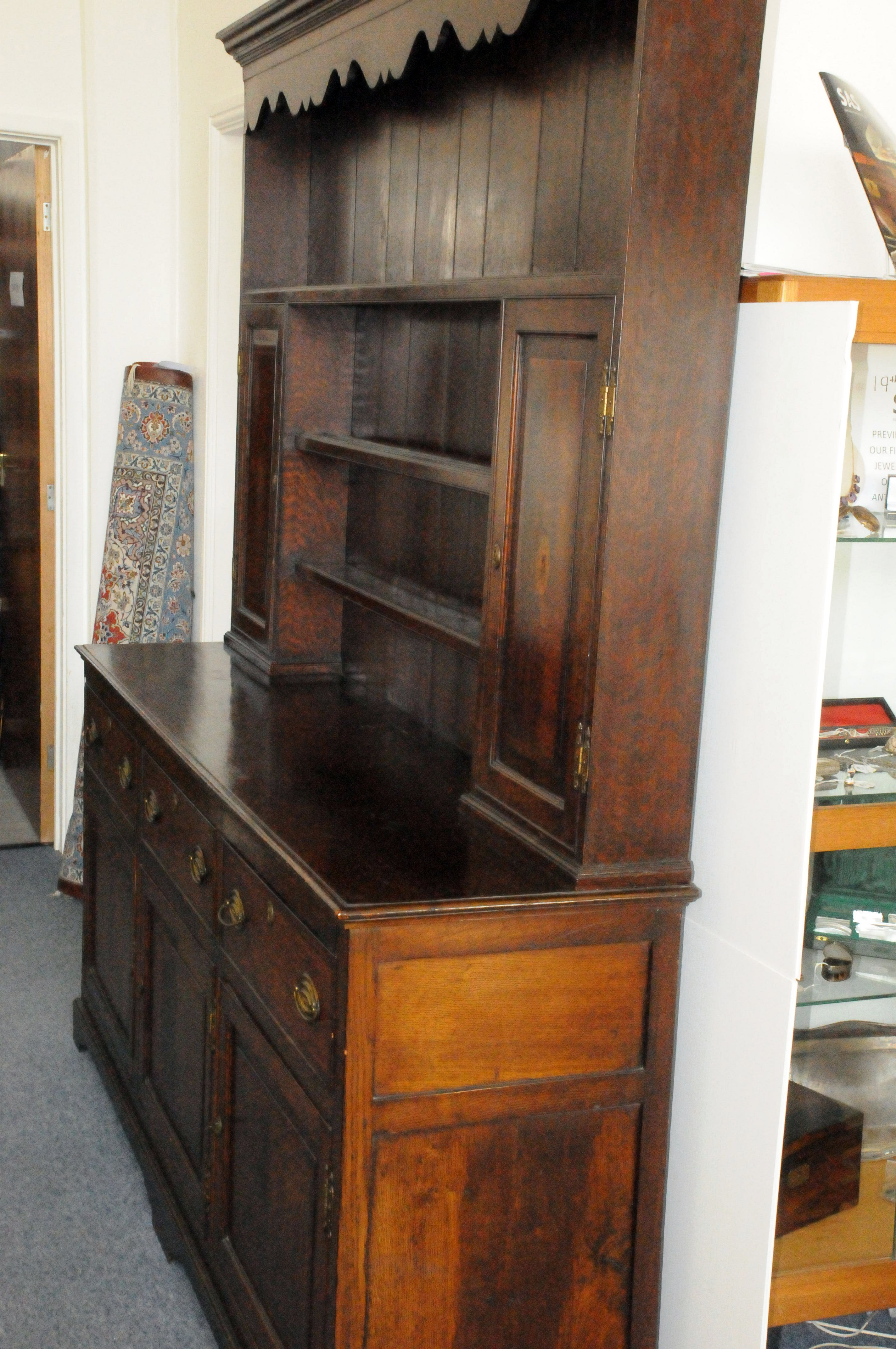 A George III period oak sideboard dresser, the base with three doors and drawers below shelved upper - Image 4 of 5