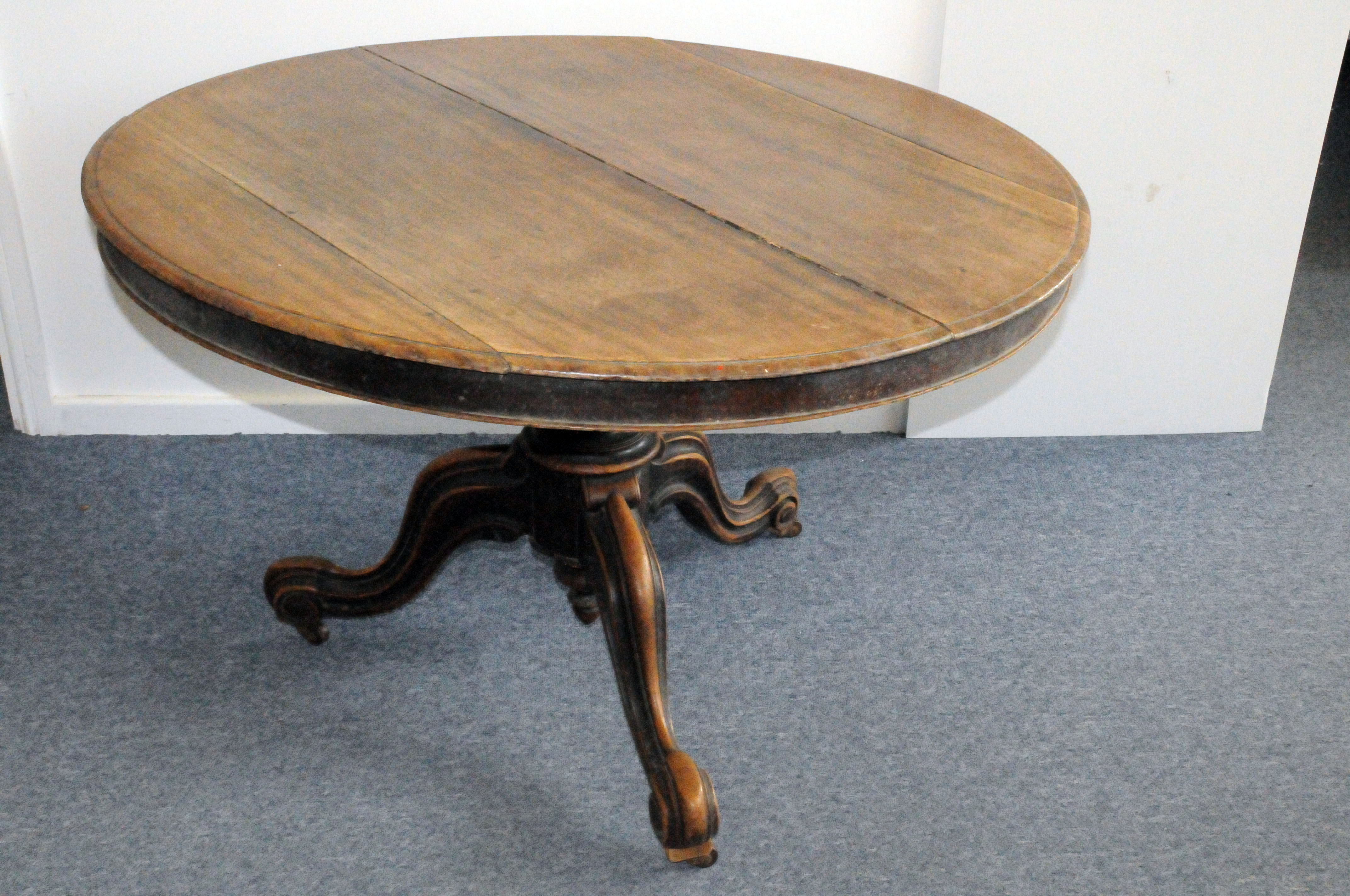 A Victorian mahogany breakfast table, the circular top, AF, on tripod pedastal base