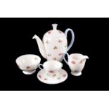 A Shelley porcelain coffee set, comprising six cups and saucers, coffee jug, sucier and cream jug,