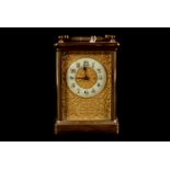 A early 20 century Carriage Clock, time only single train, cream dial with Arabic numerals and