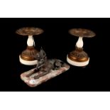 An Art Deco animalier bronze of an Alsatian on a two tone marble base 24cm L, together with a pair