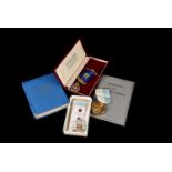 A small group of 20th century Masonic items, including a silver gilt ROAB jewel, a gilt Charity