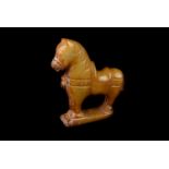 A small Chinese hardstone horse, the horse shaped figure with engraved design, approx. 8cm H