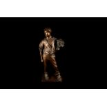 R.G Wheaton, 1903 bronze figure of a gentleman with flowers, signed and dated to base, approx.