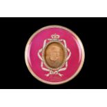 An Edward Askew wall mounted commemorative plate, the pink ground porcelain plate having gilt