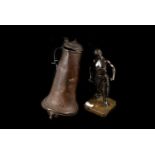 Two spelter blacksmith figures, together with three tall pewter water jugs, AF (5)