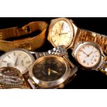A group of vintage and modern watches, including a gold plated Seiko 5 automatic in box, a stainless