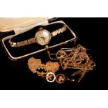 Seven 9ct gold items of jewellery and a 9ct gold cased lady's wristwatch, including an Edwardian