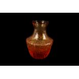 A pot bellied amber coloured glass vase by Whitefriars, having textured body with graduated