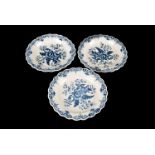 A set of three 18th century Caughley side plates, decorated with floral sprays within a Fitzhugh