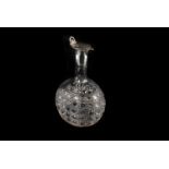 A Victorian silver and cut glass claret jug by H.A, dated Sheffield 1884 and bearing family crest of