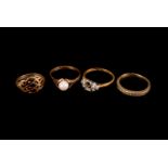 A group of four gold rings, including a 9ct gold and pearl solitaire ring, a Celtic knot example,