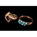 A modern 9ct gold and gem set ring, having central tanzanite style blue stone and four rows of