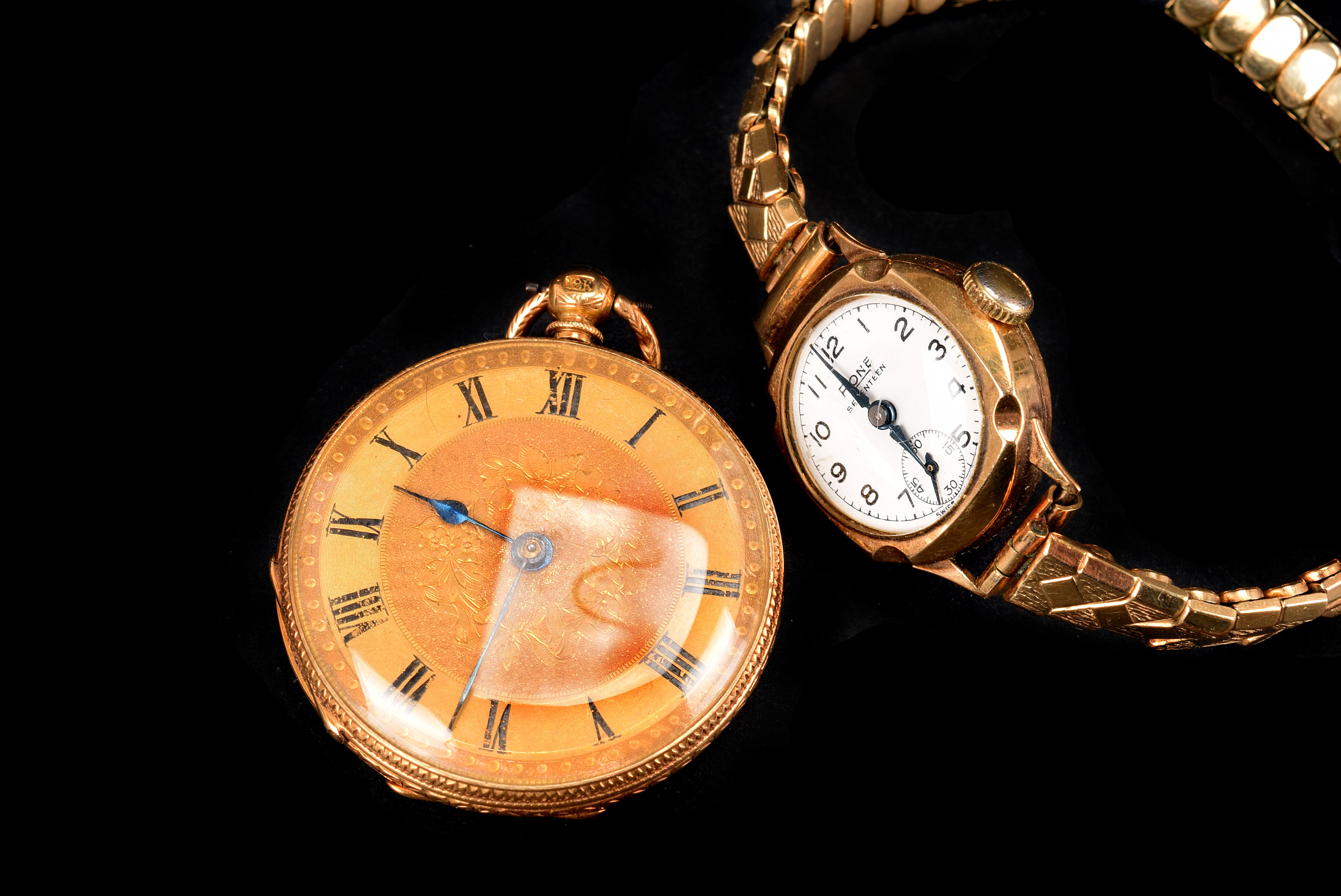 An Edwardian period 18ct gold cased continental lady's pocket watch, with watch key, together with a