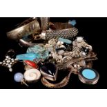 A collection of silver and white metal jewellery, including a heavy bangle with rope twist outer,