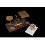A late 19th century set of postal scales, with a set of brass weights, together with a hardstone and