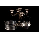 A collection of silver plated items, including a three piece tea set, kettle on stand, egg waiter,