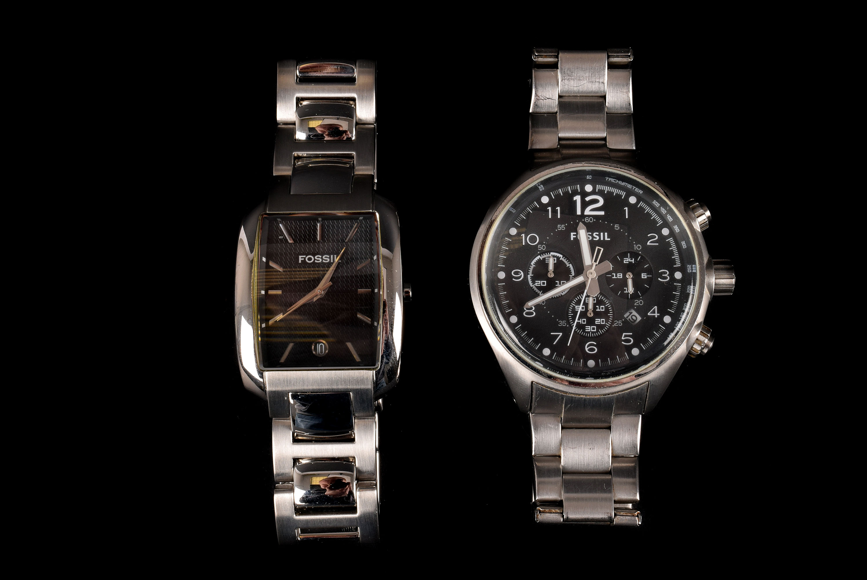 Two modern Fossil stainless steel gentlemen's wristwatches, one a chronograph, the other with