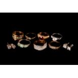 A group of seven dress rings and two pairs of ear studs, including a silver and CZ ring, a silver