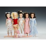 Six Sindy dolls 1970 and 80s: four brunettes, one with sleeping eyes and two blondes, wearing