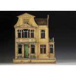 A rare Gottschalk dolls’ house No.4246, with printed paper exterior with porch, green front door and