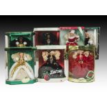 Seven Barbie Happy Holidays: comprising two 1991, one black, 1993, two 1994, one black, in