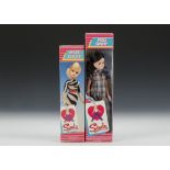 Two Pedigree Miss Sindy dolls, one with brunette hair No.42008 in plaid trouser suit, in original