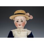 A J.D. Kestner 260 character baby, with brown sleeping eyes on jointed composition child doll