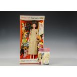 A Palitoy Tressy 1960s, brunette and gold dress, in original box (missing cellophane)