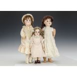 Three bisque headed dolls: a Kley & Hahn 250 Walkure on composition body - 211?2in. (55cm.) high (