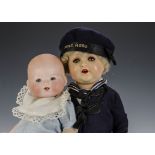 An Armand Marseille 351 baby doll, with blue sleeping eyes, blond painted hair, bent-limbed