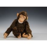 A good Steiff Jocko monkey, 1950s, with brown mohair, clear and black glass eyes with brown packs,