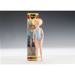 A Pedigree Sunshine Sindy No.44713, with short blonde hair, blue and white striped swim suit and