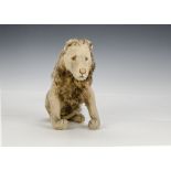 An unusual seated Steiff lion 1920s, with golden mohair, clear and black glass eyes with brown