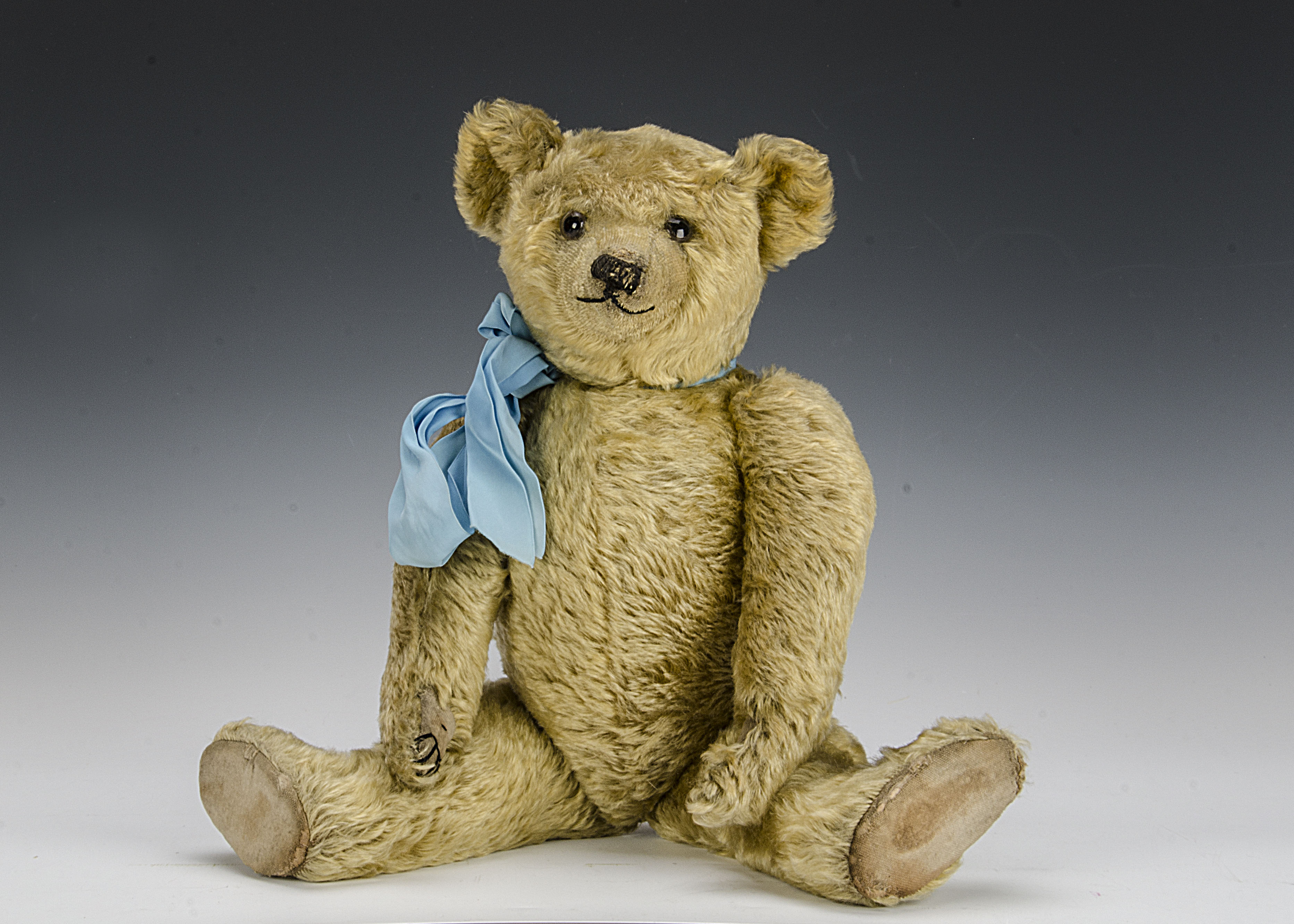 A fine Farnell Teddy Bear 1920s, with golden mohair, clear and black glass eyes with brown painted