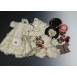 A quantity of doll’s clothes: a green velvet hat, white mohair coat, three collars and bonnet, ‘