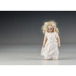 A small Simon & Halbig 1079 DEP child doll, with brown sleeping eyes, original blonde mohair wig,