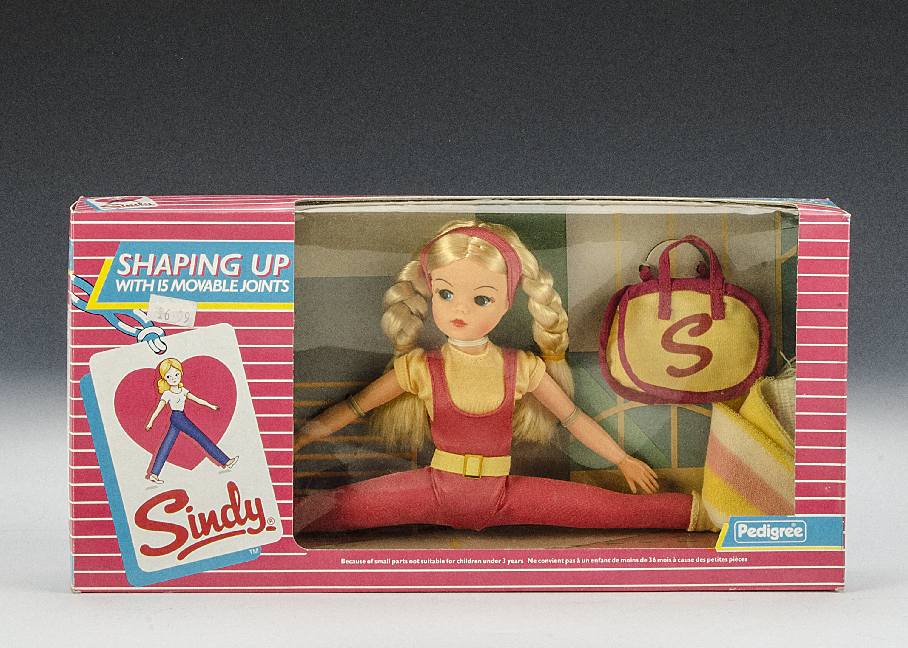 A Pedigree Shaping Up Sindy, No.42014, 1985, with blonde hair, in original pink and white striped