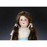 A Max Oscar Arnold 200 child doll, with blue sleeping eyes, later brown hair wig, jointed