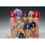 Thirteen naked Hasbro Jem dolls: two Rio and a mix of girls, an extra head (slight play wear)