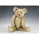 A Chad Valley teddy bear 1930s, with light brown, pronounced muzzle, black stitched nose, mouth