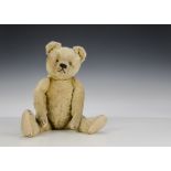 A rare Bing Teddy Bear, 1920s, with golden mohair, clear and black glass eyes with brown painted