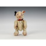 An extremely rare Steiff Begging Bonzo 1927, of cream velvet, clear glass eyes with dark pink and
