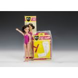 A Pedigree Summertime Fun Sindy, with brunette hair and cerise swimsuit, in original box; and a