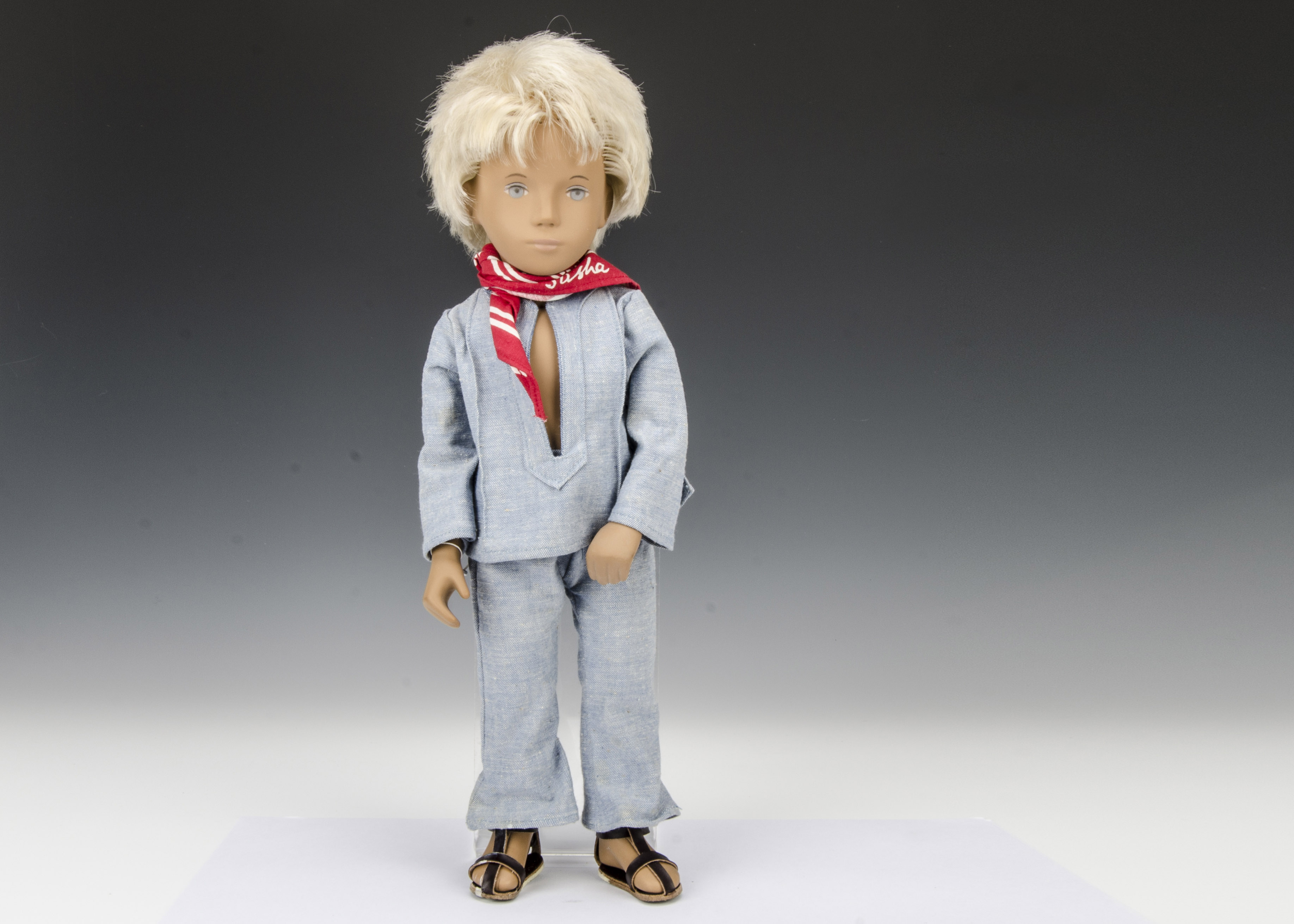 A Trendon Sasha doll Gregor Fair Blue Suit, 302, with light blonde hair, pale denim trouser suit,