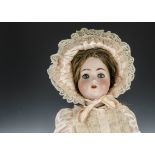 An Alt, Beck & Gottschalk 1362 child doll, with blue lashed sleeping eyes, brown hair wig, jointed