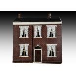 A large late 19th century carpenter built red brick dolls’ house, painted brick exterior, white