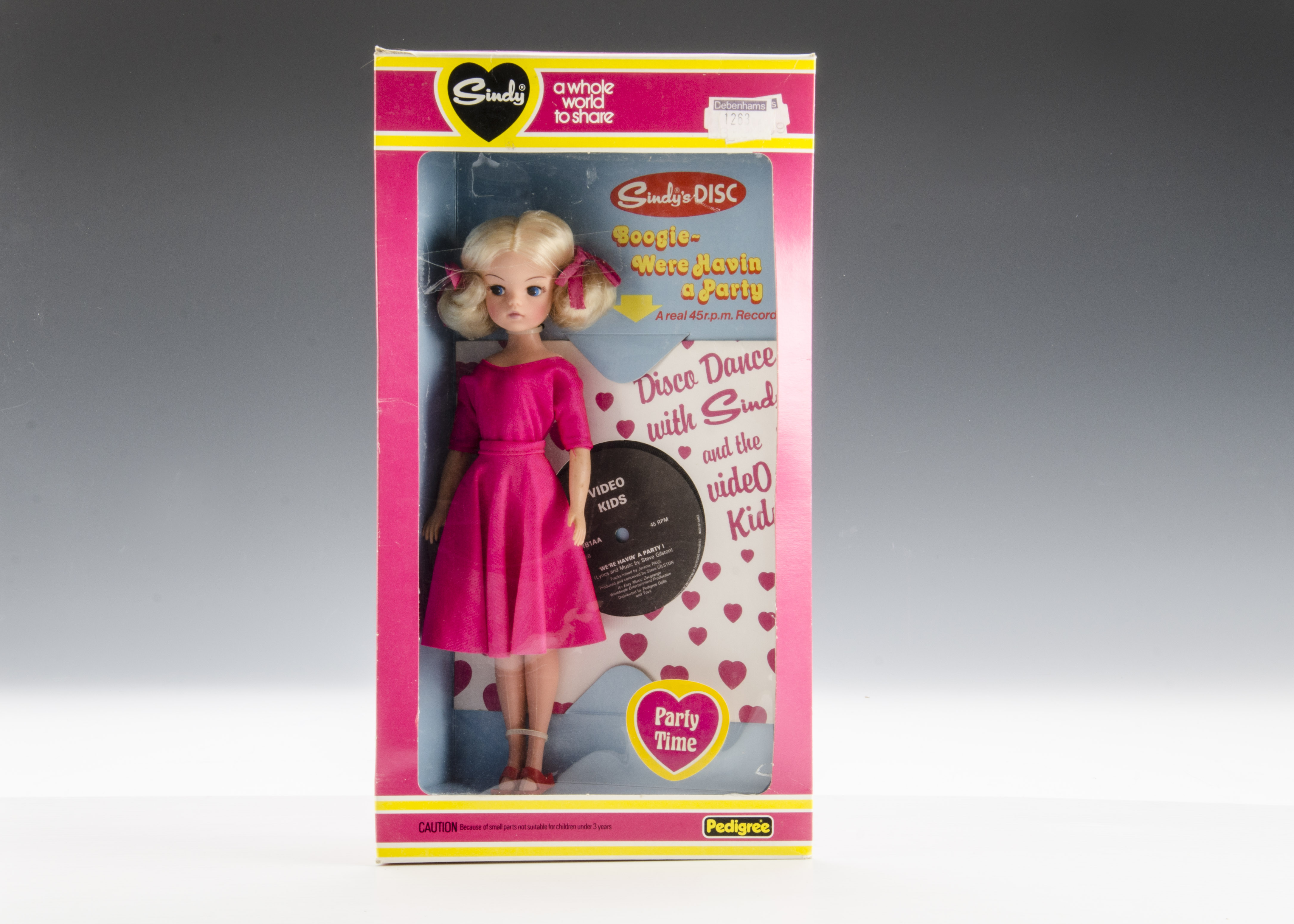 A Pedigree Party Time Sindy No.44743, 1981, with blonde hair and pink dress, in original pink and